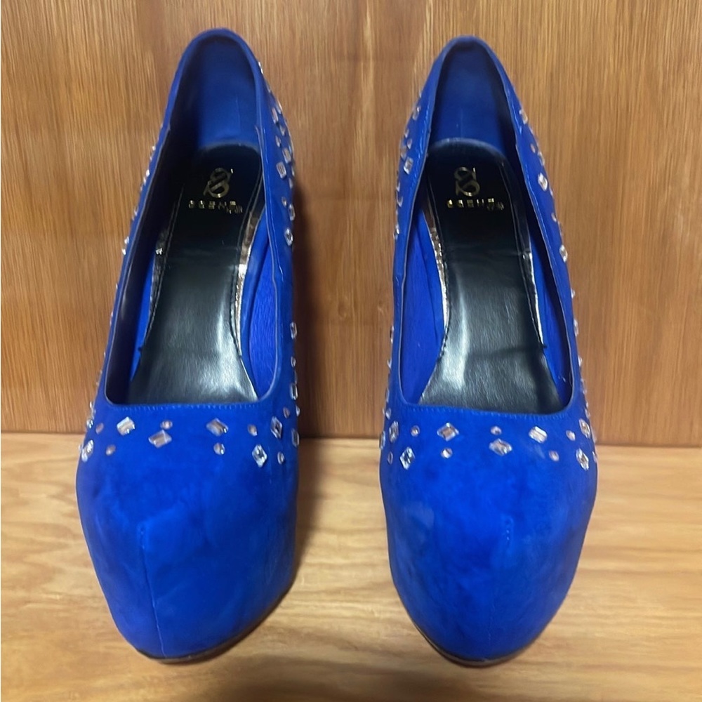 Bright blue heels with jewels.